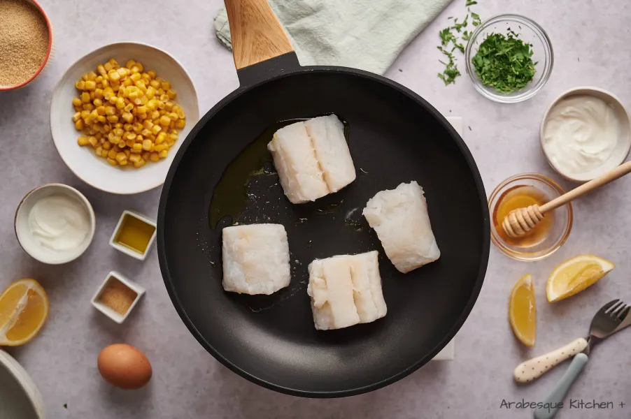 In a non-stick skillet, cook white fish with a bit of olive oil until flaky.
