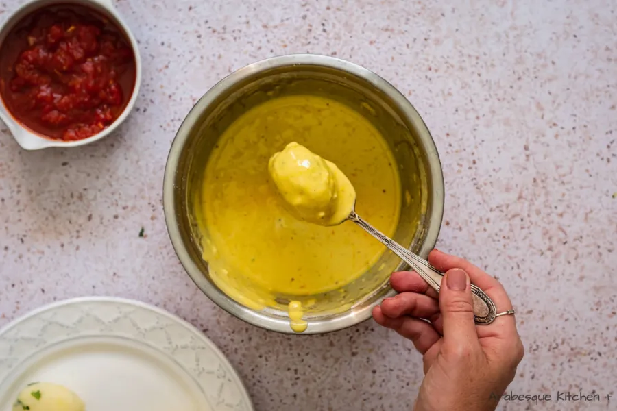 Mix the flour, instant yeast, cornstarch, water, saffron powder, salt and pepper in a bowl. The batter should be runny, like a pancake’s mix. Let it proof for 12 minutes.
