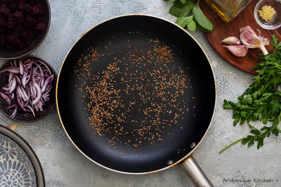 Heat a skillet to medium-high and roast the cumin seeds for 2-3 minutes. Transfer to a mortar and grind them until they are grainy.
