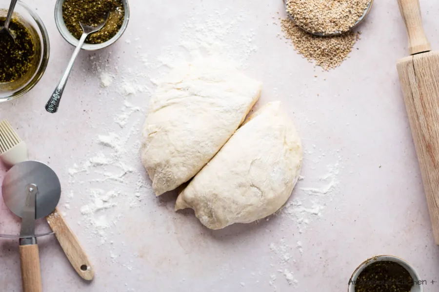 Divide the dough in 2 halves and roll each into a circle.
